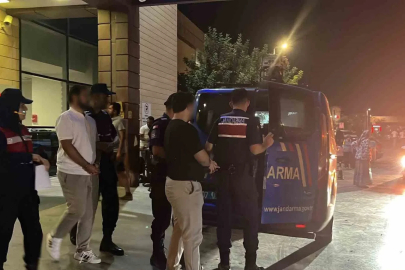 Vize dolandırıcılığı operasyonunda şüpheliler ve yakınları gazetecilere tepki gösterdi
