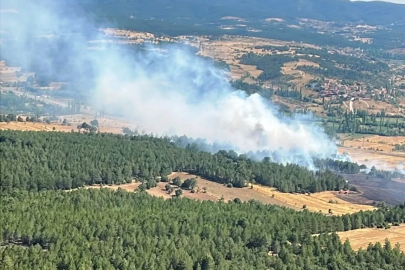Emet’te ormanlık alana sıçrayan yangın kontrol altına alındı
