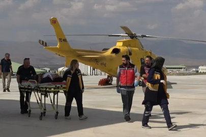Ambulans helikopter traktör altında kalan genç için havalandı

