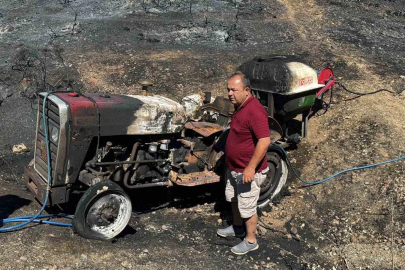 Yangına yardıma gitti, traktörü alevlerin arasında kaldı: "Kaçmasaydım yanacaktım"
