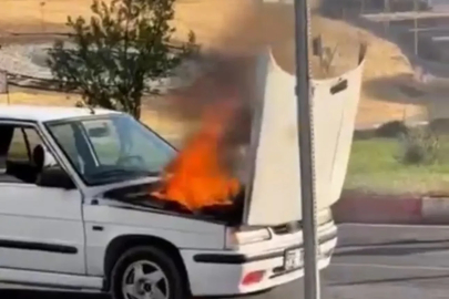 Siirt’te seyir halindeki otomobil alev aldı, yangını belediye otobüs şoförü söndürdü
