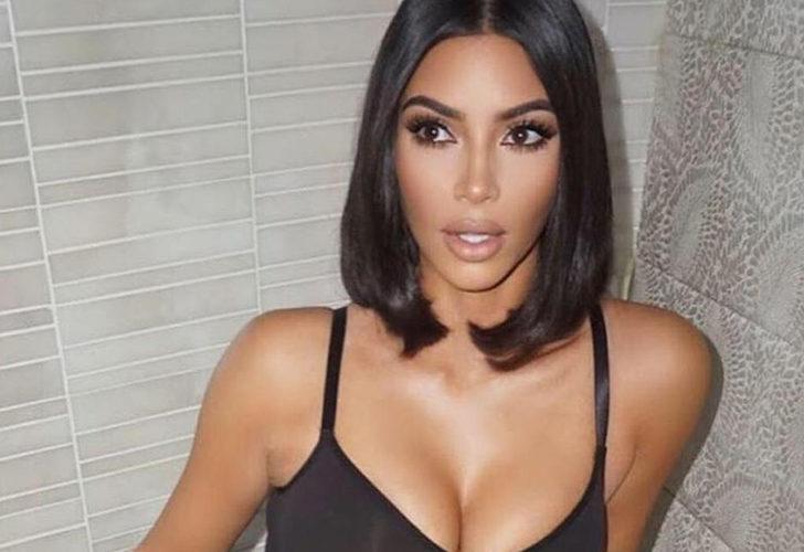 Kim Kardashian soluğu havuzda aldı! Siyah bikinisi göz kamaştırdı