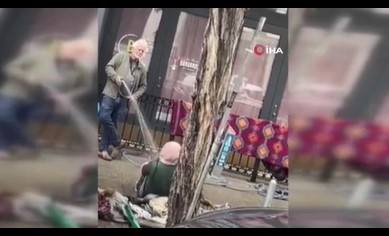 Evsiz kadını hortumla ıslatarak işkence etti Evsiz kadını hortumla ıslatarak işkence etti