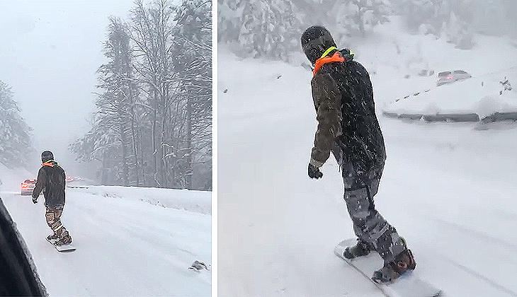 Uludağ yolunda trafik oluştu, o snowboard yaparak indi