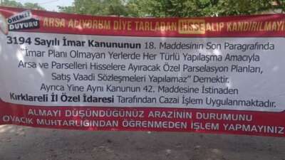 Muhtardan, arsa alanlara uyarı pankartı
