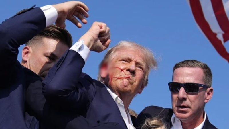 Trump, yüzünün kanlı olduğu fotoğrafıyla kampanyasına bağış istedi