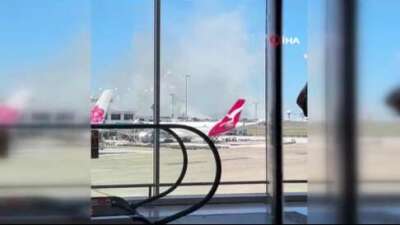Yolcu uçağı Sydney Havalimanı’nda acil iniş yaparken pist yanında yangın çıktı